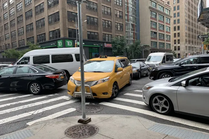 Cars are packed at an intersection in lower Manhattan